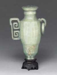 19TH CENTURY AN UNUSUAL CELADON JADE VASE AND COVER
